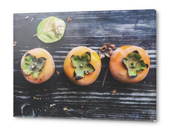 persimmons on the wooden table Acrylic prints by Timmy333