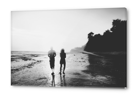 walking on the with sunset light in black and white Acrylic prints by Timmy333