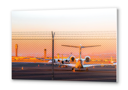 Airplane at Las Vegas airport USA with sunset sky Metal prints by Timmy333