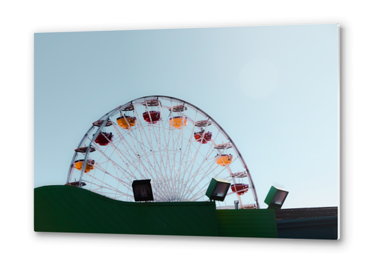 colorful ferris wheel at Santa Monica pier California USA with blue sky Metal prints by Timmy333