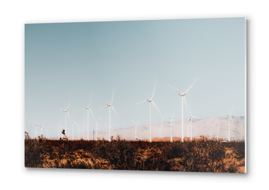 Wind turbine in the desert with summer blue sky at Kern County California USA Metal prints by Timmy333