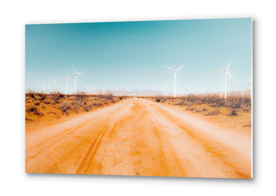 Wind turbine and sandy road desert with blue sky in California USA Metal prints by Timmy333