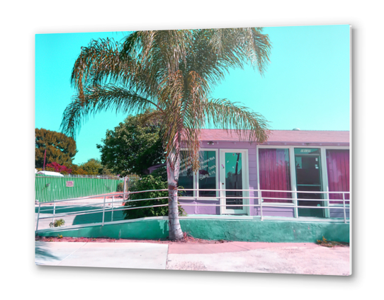 pink building in the city with palm tree and blue sky Metal prints by Timmy333