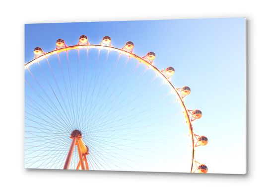 orange Ferris Wheel in the city with blue sky  Metal prints by Timmy333