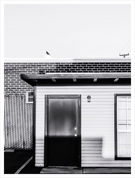 wood building with brick building background in black and white Art Print by Timmy333