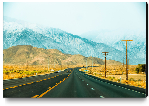 countryside road with mountains and foggy sky view in California, USA Canvas Print by Timmy333