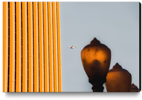 Urban Light with building and airplane at LACMA Los Angeles California USA Canvas Print by Timmy333