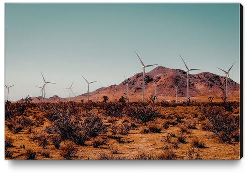 Wind turbine in the desert with mountain view at Kern County California USA Canvas Print by Timmy333