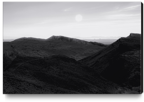 mountain in the desert with summer sky at Red rock canyon state park California in black and white Canvas Print by Timmy333