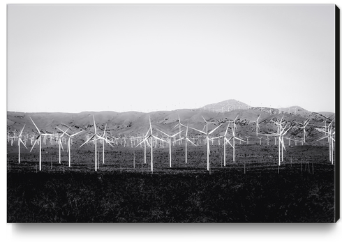 wind turbine in the desert with mountain background in black and white Canvas Print by Timmy333