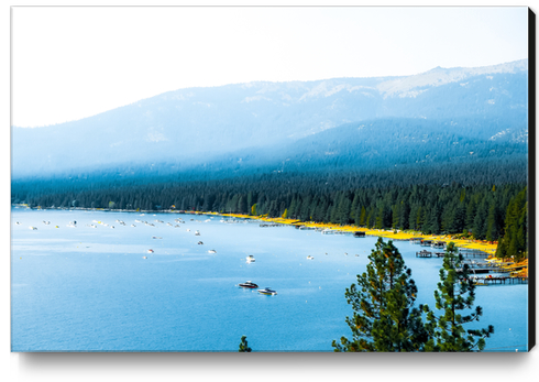 boats on the blue lake with pine tree and mountains at Lake Tahoe, Nevada, USA Canvas Print by Timmy333