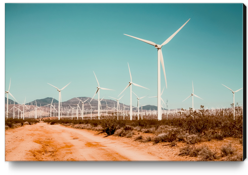 Wind turbine farm in the desert at Kern County California USA Canvas Print by Timmy333