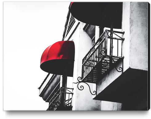 building with porch and red awning in the city Canvas Print by Timmy333