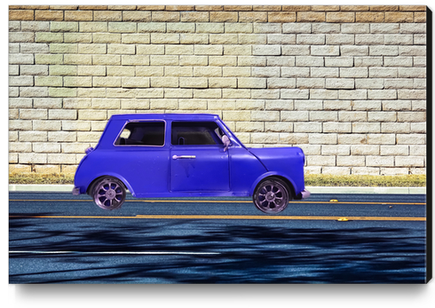 blue classic car on the road with brick wall background Canvas Print by Timmy333