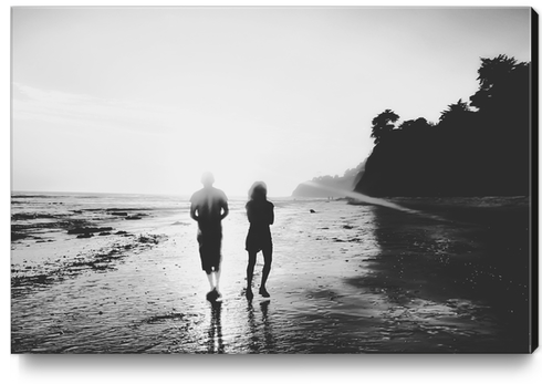 walking on the with sunset light in black and white Canvas Print by Timmy333