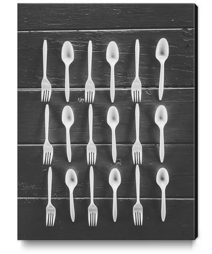 forks and spoons on the wooden table in black and white Canvas Print by Timmy333