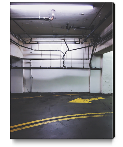 parking lot with the yellow arrow and tubes Canvas Print by Timmy333