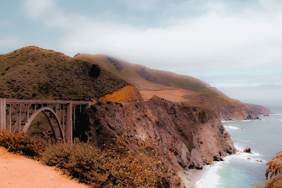 Bridge and mountain with ocean view at Bixby Creek Bridge, Big Sur, Highway 1, California, USA by Timmy333