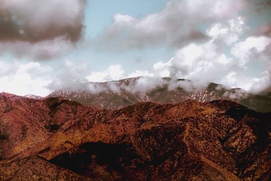 View from the hiking trail with mountain view and blue cloudy sky to Hollywood sign Los Angeles California USA by Timmy333