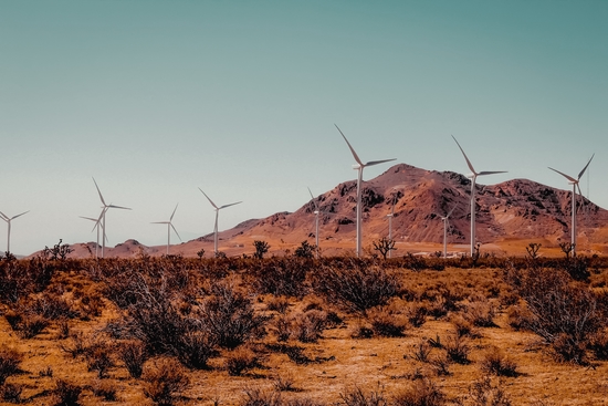 Wind turbine in the desert with mountain view at Kern County California USA by Timmy333