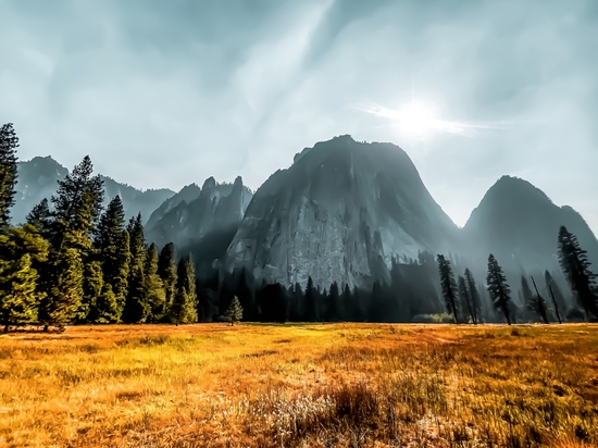 Mountains scenic with blue cloudy sky at Yosemite national park, California, USA by Timmy333