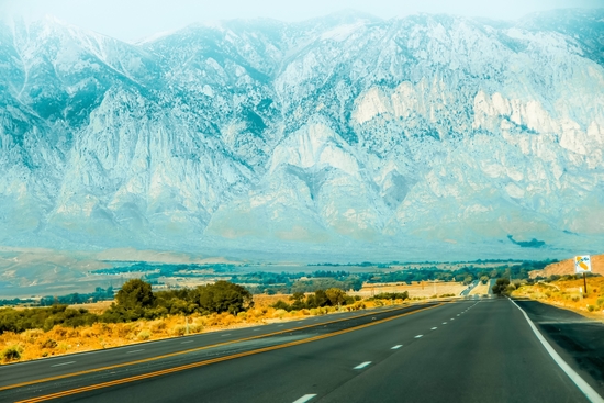 countryside road with mountains and foggy sky view in California, USA by Timmy333