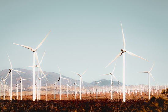 Wind turbine with mountain background in the desert at Kern County California USA by Timmy333