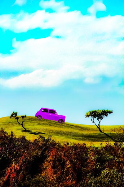 pink classic car on the green mountain with cloudy blue sky by Timmy333