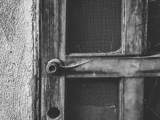 old vintage wooden door in black and white by Timmy333