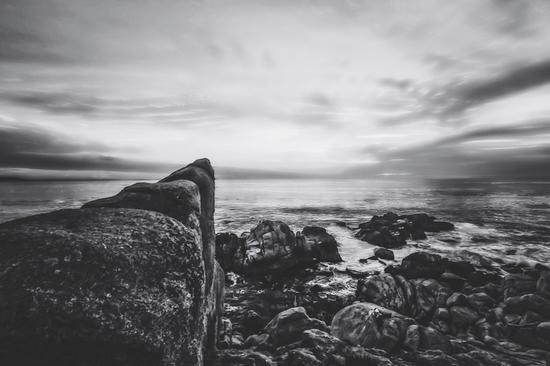 ocean sunset view with beautiful blue cloudy sky in black and white by Timmy333