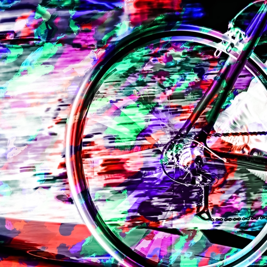 bicycle wheel with colorful abstract background in green red and purple by Timmy333