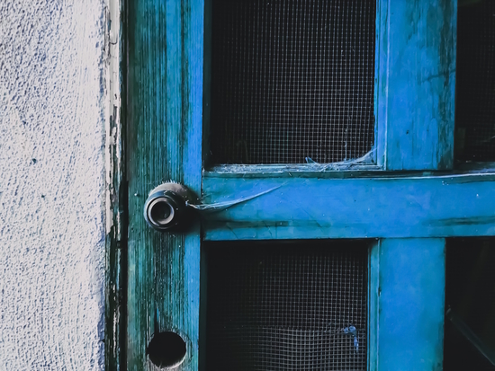 closeup old blue vintage wood door texture background by Timmy333