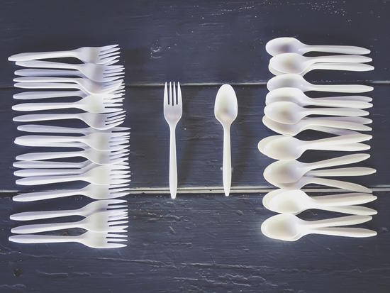 plastic forks and plastic spoons with wooden table by Timmy333