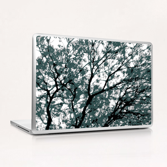 tree branch with green leaves abstract background Laptop & iPad Skin by Timmy333