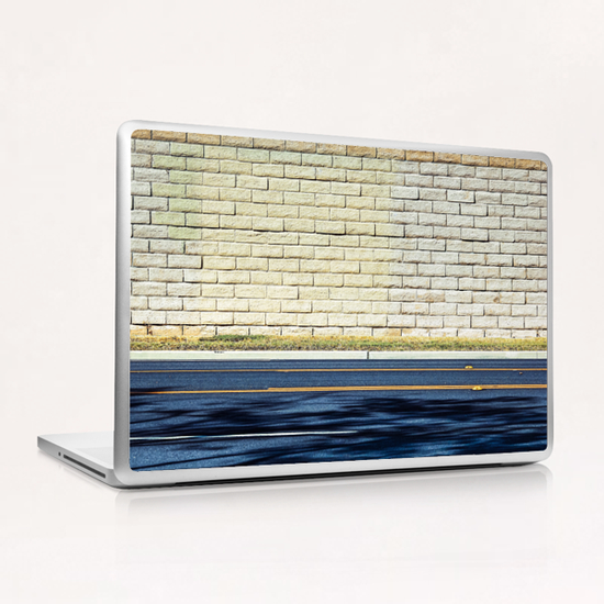 road with shadows and brick wall background Laptop & iPad Skin by Timmy333