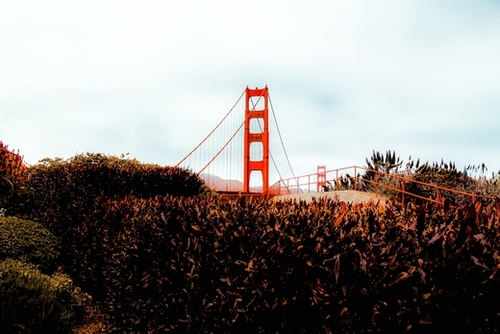 Golden Gate Bridge with blue cloudy sky at San Francisco, USA Mural by Timmy333